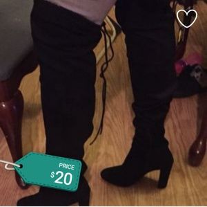 Thigh high black boots